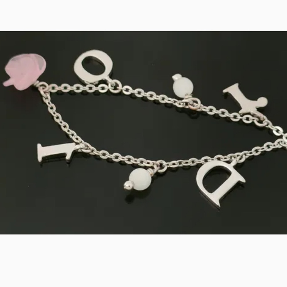 Christian Dior Silver Rose Motif and Rhinestone Logo
Bracelet - Picture 4 of 10